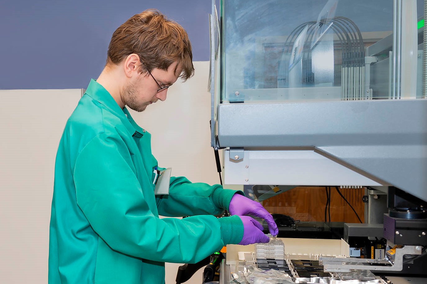 Lab tech at robot