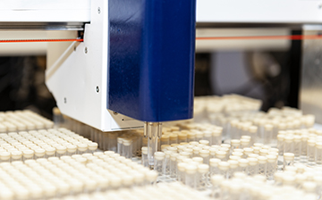 Robot with tray of tubes